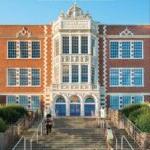 Cover of Building for Learning, SPS Histories, 1862-2022, Garfield high school building exterior in background